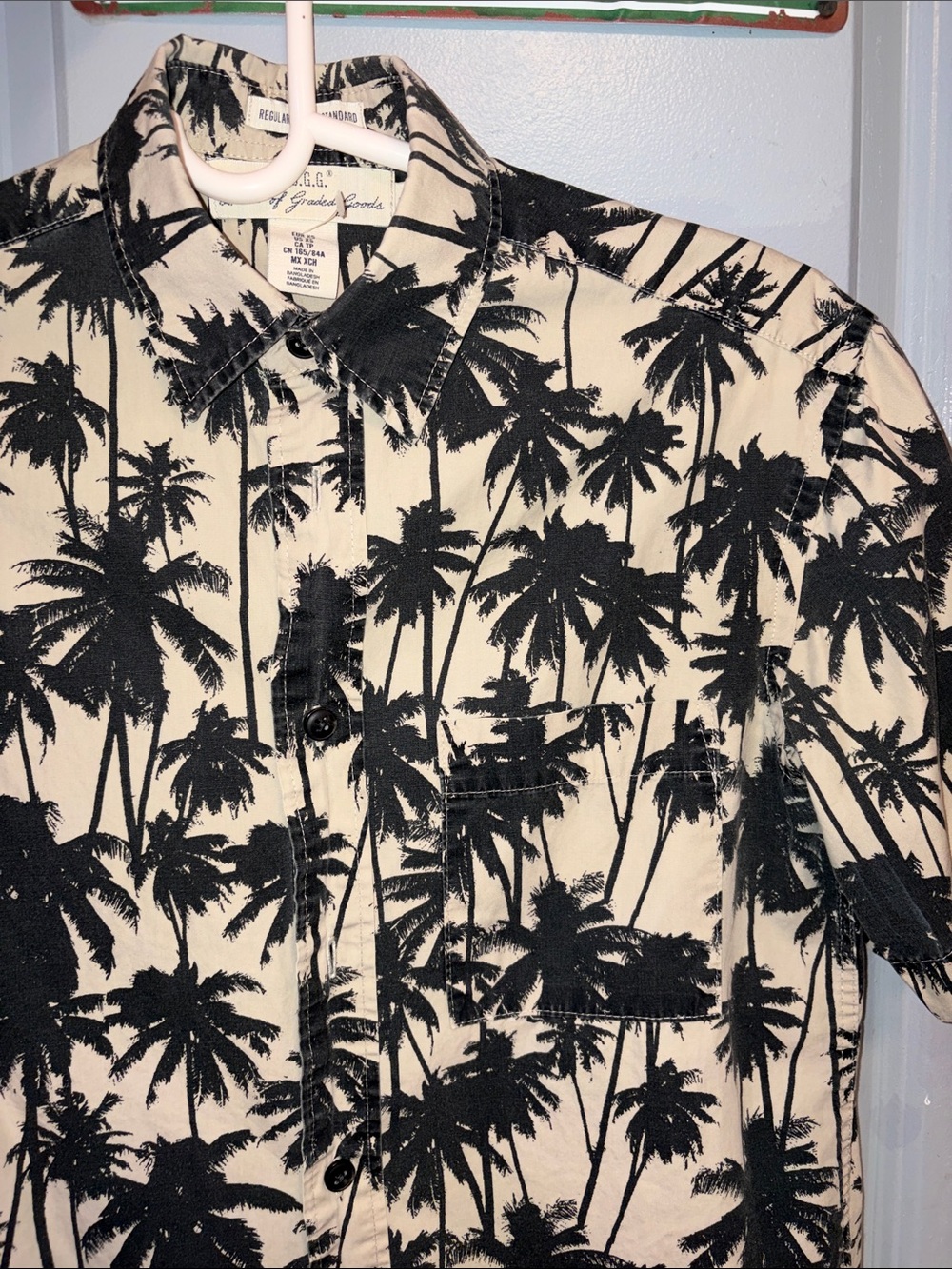 H&M Black Palm-Print Short Sleeve Shirt on Cream